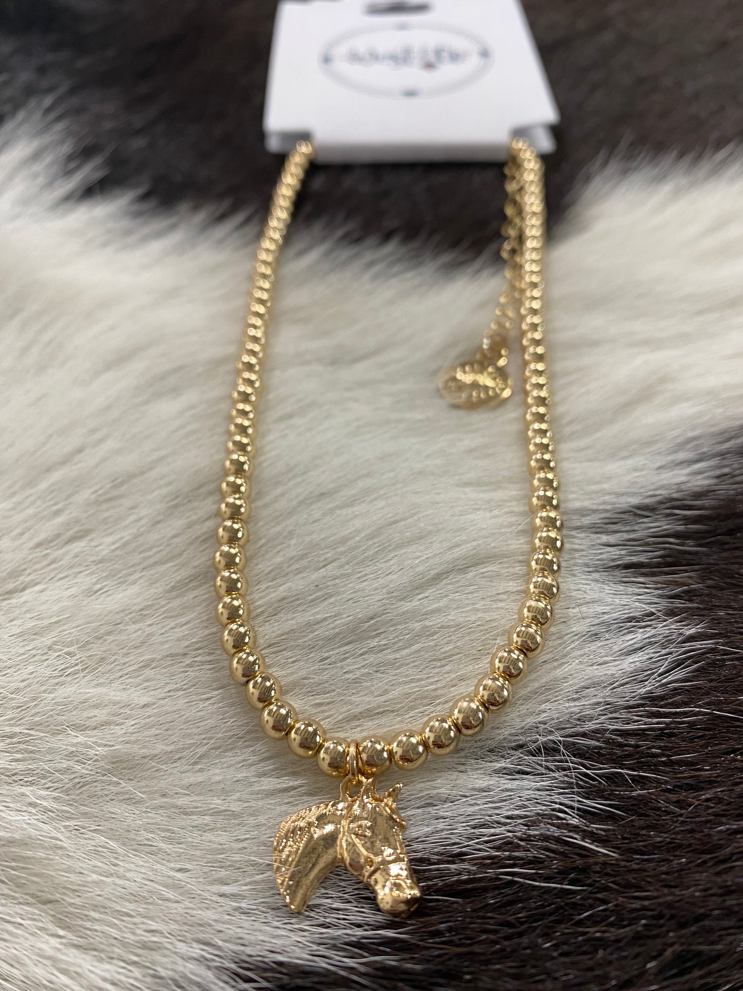WEST N CO DAINTY GOLD BEADED NECKLACE WITH HORSE HEAD CHARM