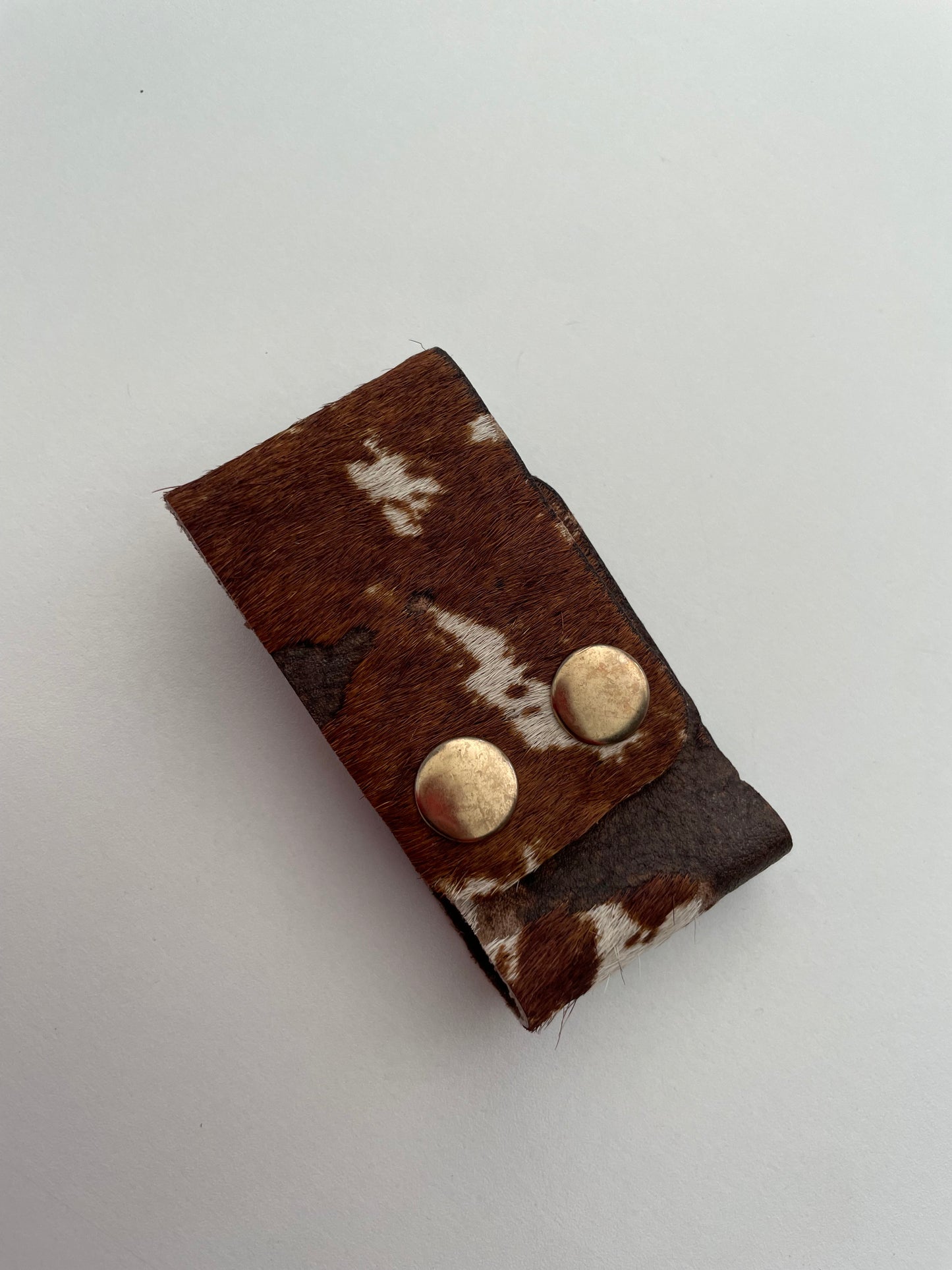 COWHIDE CONCHO BRACELET
